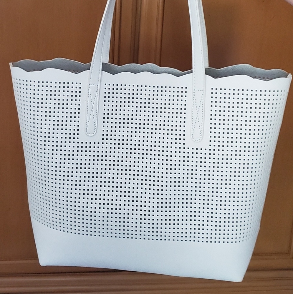 Neiman Marcus white leather tote.